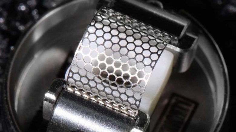 Vape mesh coil close-up, advanced coil technology, even heating element e-cigarette